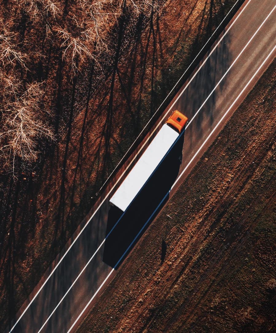 Aerial view of a truck on a road